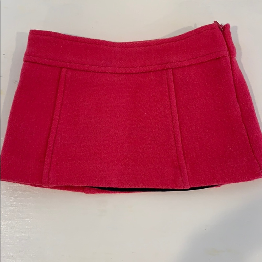 Milly mini wool skirt in bright pink.